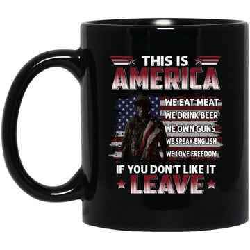 This Is America We Eat Meat We Drink Beer We Own Guns We Speak English We Love Freedom If You Don’t Like It Leave Veteran US Flag Mug