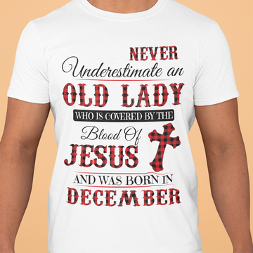 Never Underestimale An Old Lady Who Is Covered By The Blood Of Jesus And Was Born In December Shirt - Standard T-Shirt